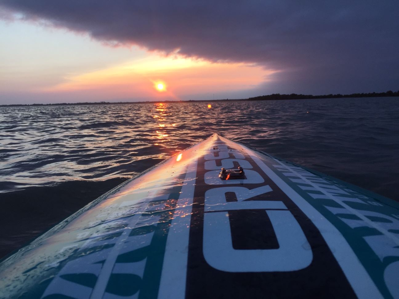 Paddle Boarding at El Dorado Lake at Sunset by David Wernli